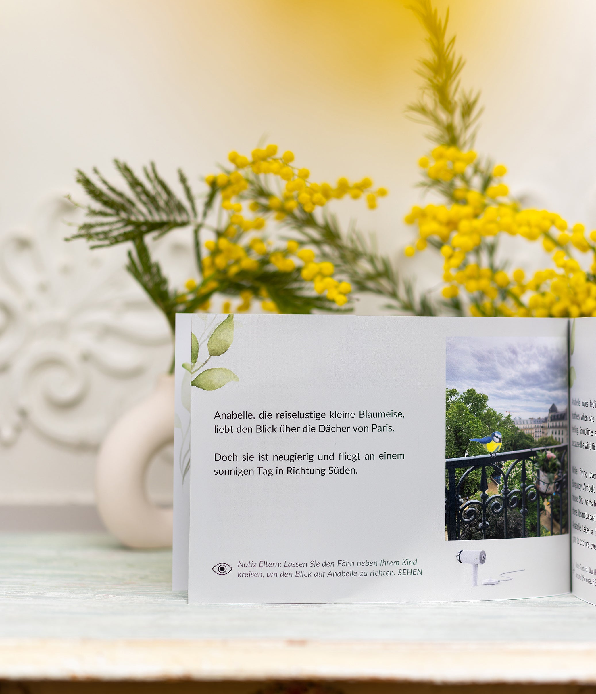 Version German: Anabelle, the curious blue tit, meets Monsieur Herisson on her trip to Burgundy